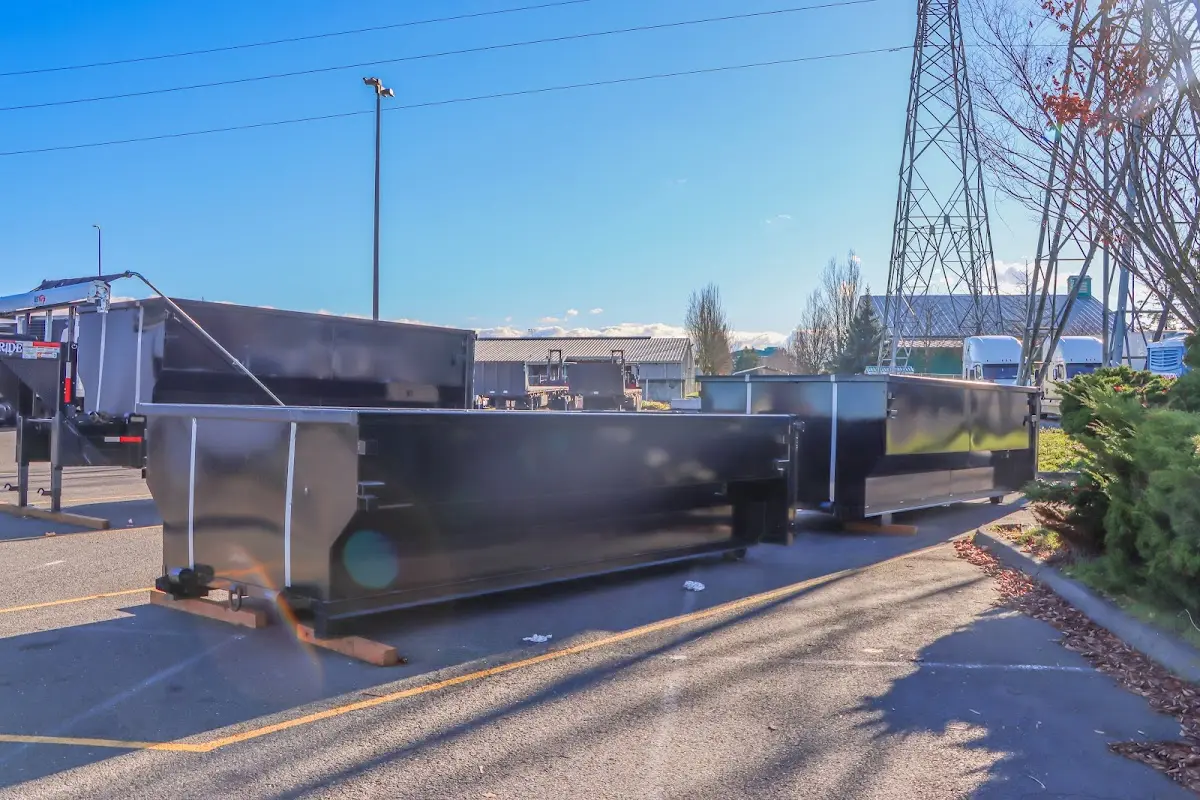 Roll-off dumpster ready for waste disposal at job site for 2 Yard Dumpster Rental in Greenville